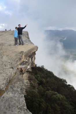 Hey "Mista," is that a rock ledge in the clouds at a location called Kings Tablelands in the Blue Mountains outside Sydney? Was it safe? Sure! ... It would have been poor taste for her to push him over the edge on their anniversary. :-)