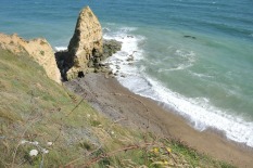 D-Day Army Rangers scaled Pointe du Hoc cliff to the camera spot; the rocky projection separates Omaha Beach and Utah Beach